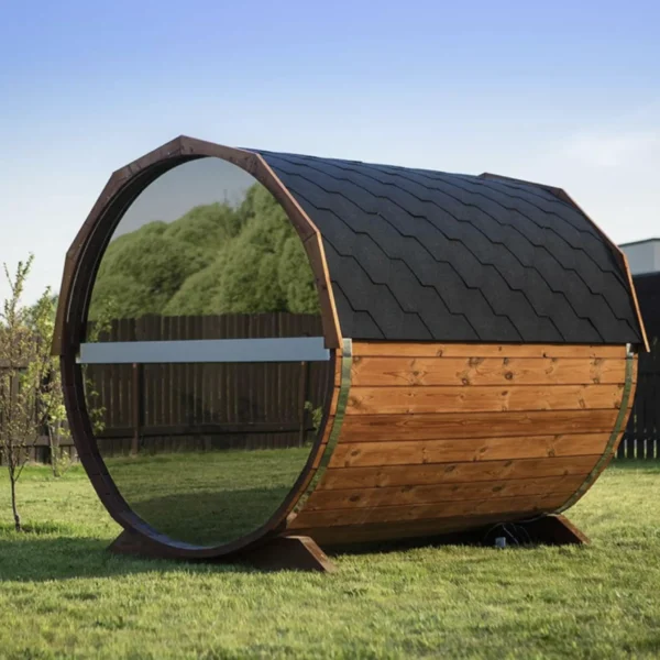 Wooden barrel sauna with mirrored panels for outdoor use.