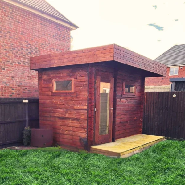 Ahti L Flat sauna with a flat roof, 3.4 x 2.3 m, featuring 50mm thick walls and a customizable additional room for shower or changing purposes. Designed with insulated roof elements for excellent thermal performance, perfect for modern outdoor spaces.