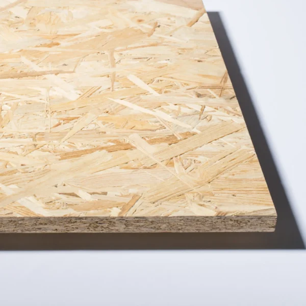 Close-up look of an OSB 3 wood-based panel, showcasing its layered texture and precise edges, ideal for construction and interior applications.